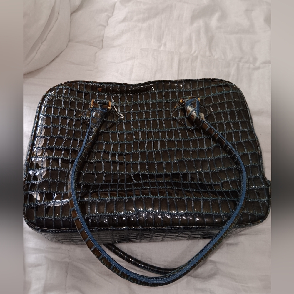 Helle comfort romu's purse spain